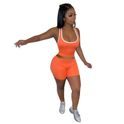 La maglia senza maniche sexy mette i vestiti in cortocircuito di sport ha fissato 13 colori puri