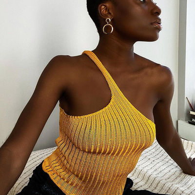 Donna della maglietta della blusa impiombata irregolare stretto sostenibile
